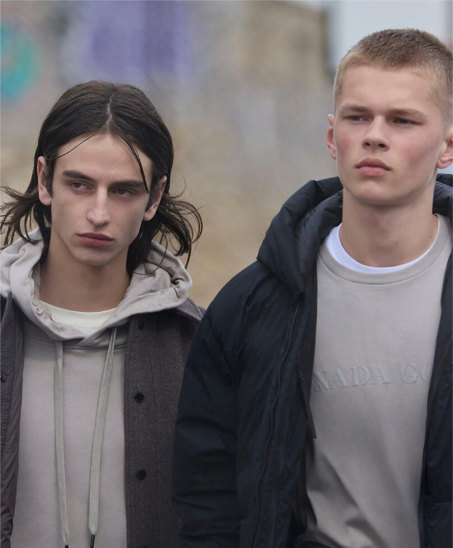 Two models in Canada Goose outerwear, close crop