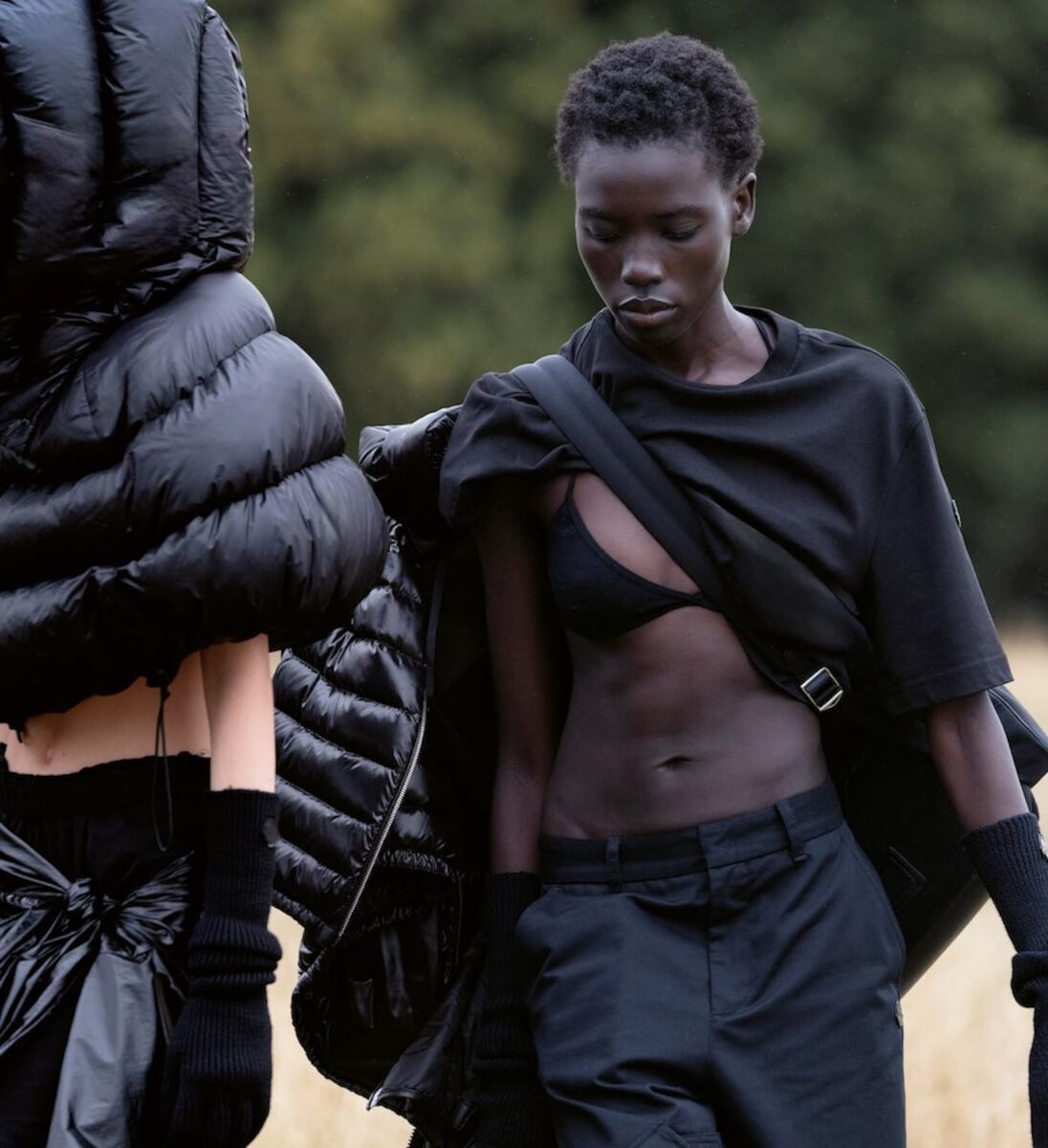 Model in black Moncler puffer with oversized Moncler balaclava
